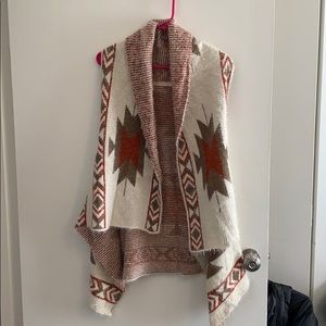 Soft, sleeveless, cardigan